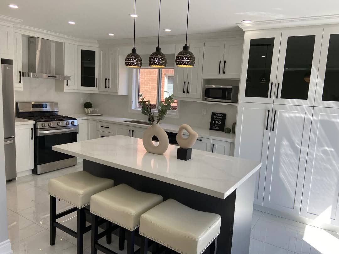 Modern two-tone custom kitchen cabinets with dark island and white wall cabinets