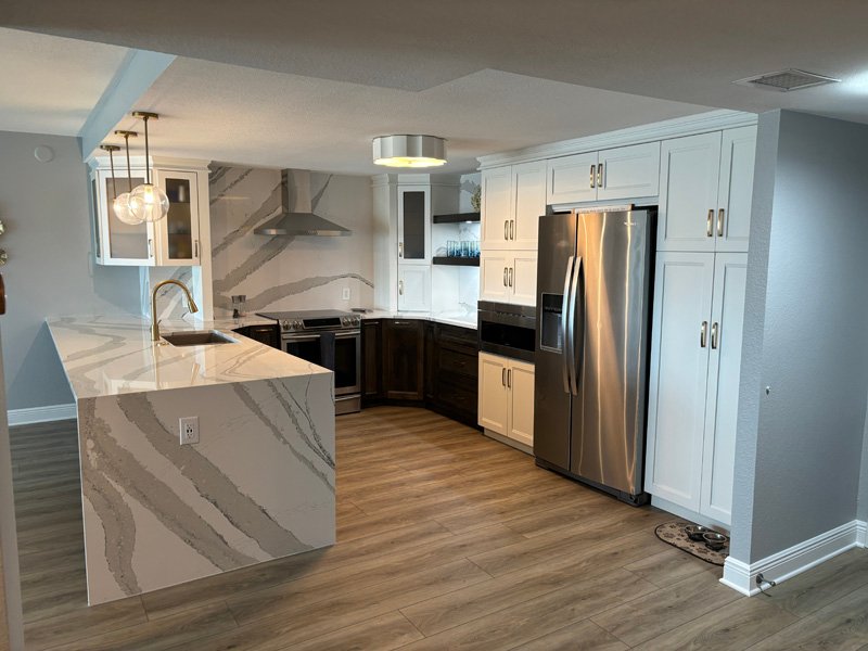 Custom shaker kitchen cabinets with quartz island countertop