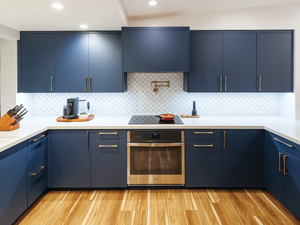 Custom kitchen cabinet installation with quartz countertops